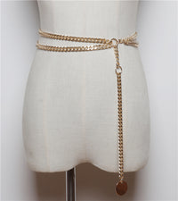 Ladies Dresses Decorated With Thin Belts And Chains