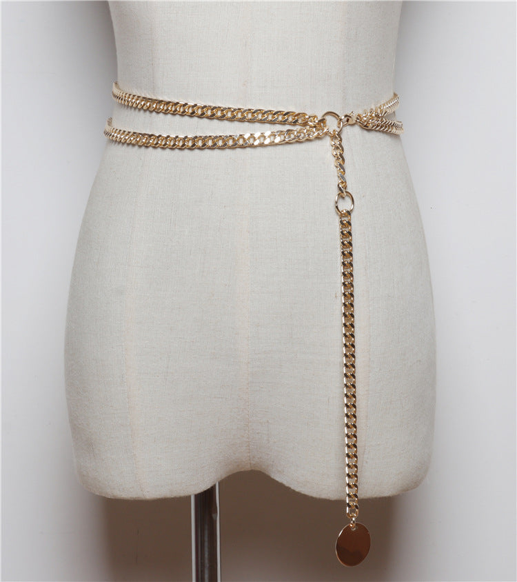 Ladies Dresses Decorated With Thin Belts And Chains