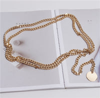 Ladies Dresses Decorated With Thin Belts And Chains