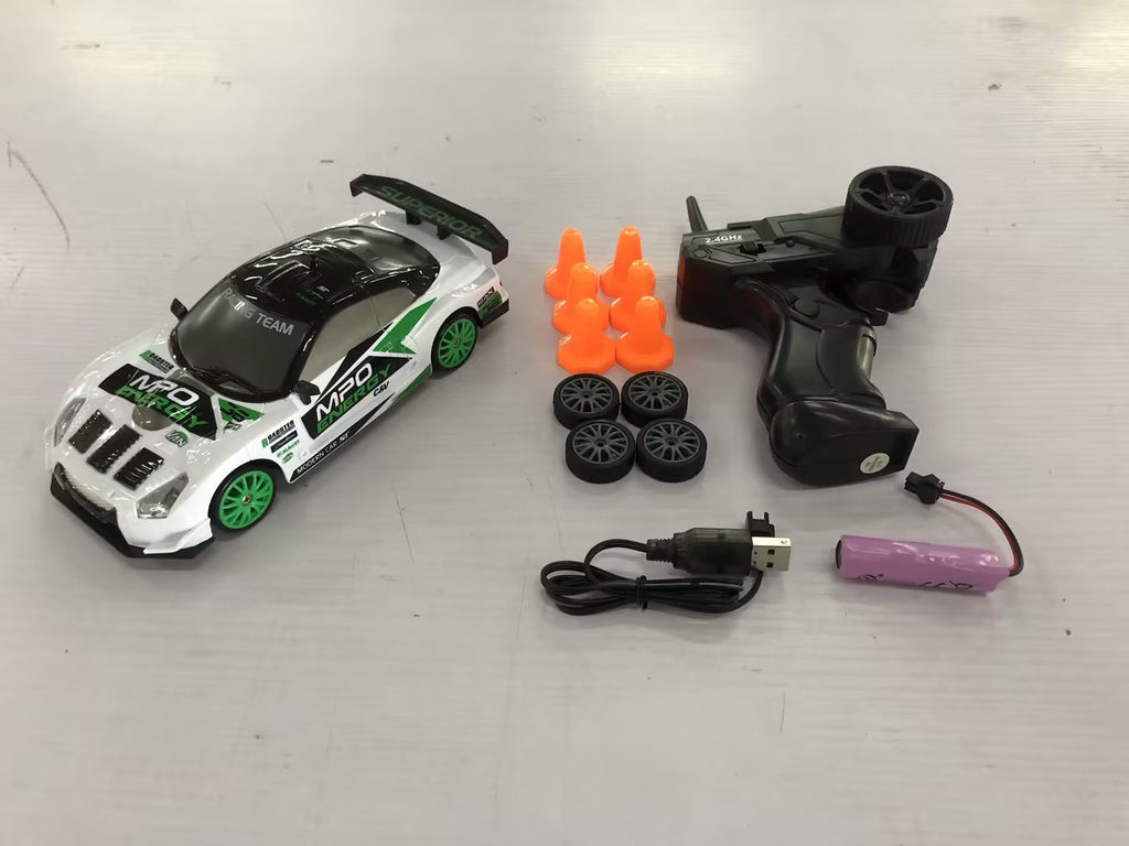 2.4GHz 1:24 4WD RC Drift Car with LED Lights – High-Speed Remote Control Racing Car for Kids (Rechargeable, Cones Included) What Else You Got?