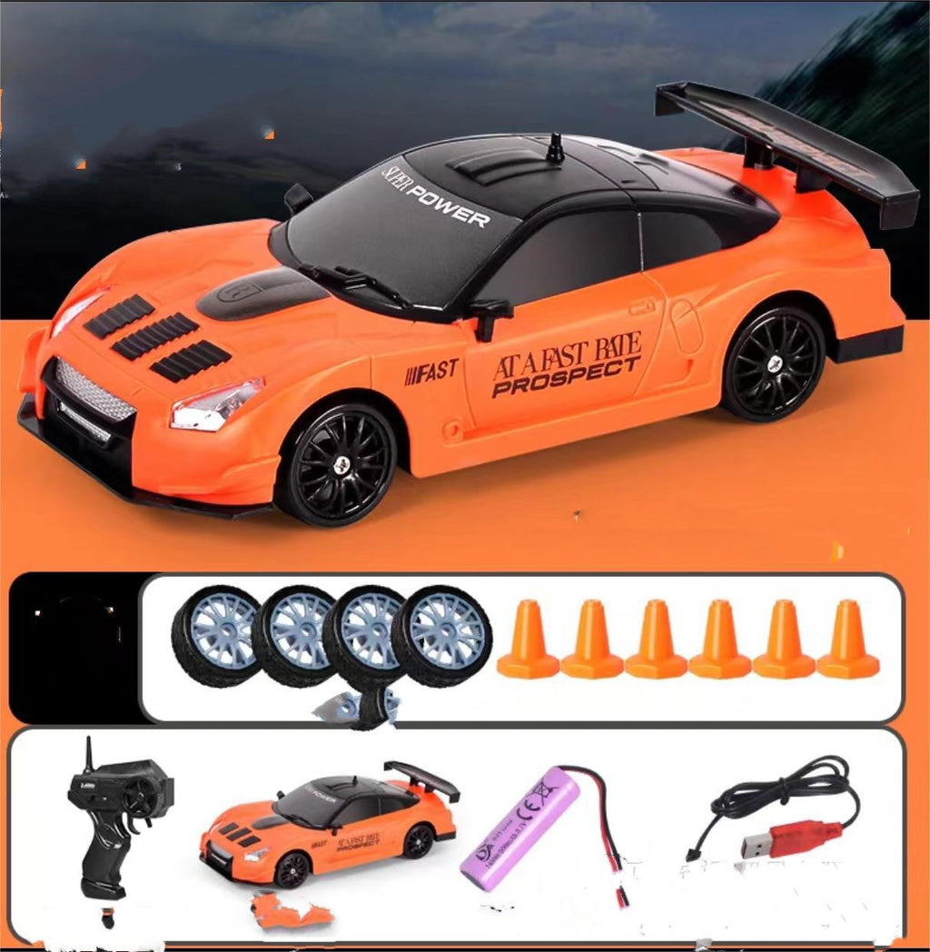 2.4GHz 1:24 4WD RC Drift Car with LED Lights – High-Speed Remote Control Racing Car for Kids (Rechargeable, Cones Included) What Else You Got?