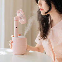 Breeze through dry air with this mini USB humidifier fan
