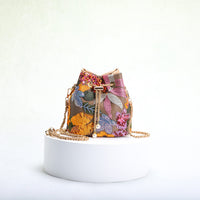 Mesh Patchwork Bucket Bag – Color-Block Drawstring Crossbody with Chain Strap