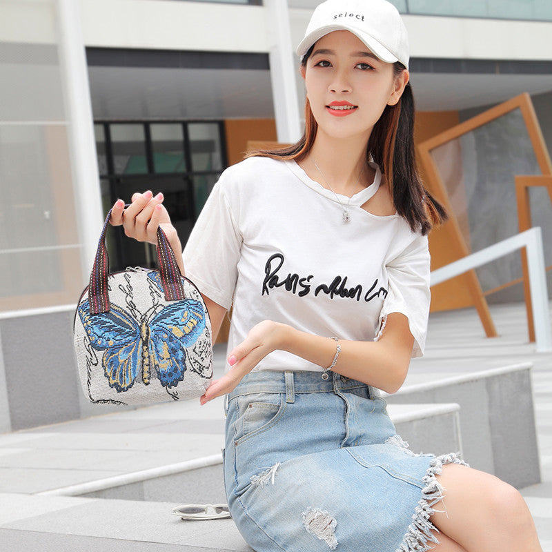 Ethnic‑Style Jacquard Tote – Artistic Shell‑Shape Handbag (Black Elephant) What Else You Got?