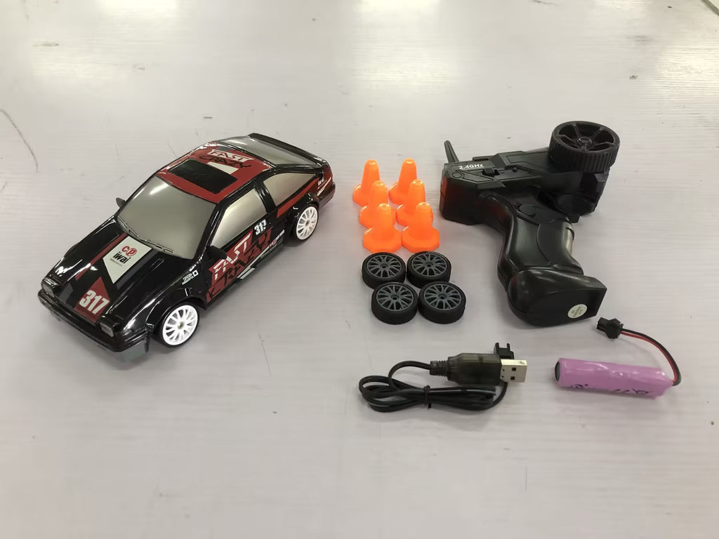 2.4GHz 1:24 4WD RC Drift Car with LED Lights – High-Speed Remote Control Racing Car for Kids (Rechargeable, Cones Included) What Else You Got?