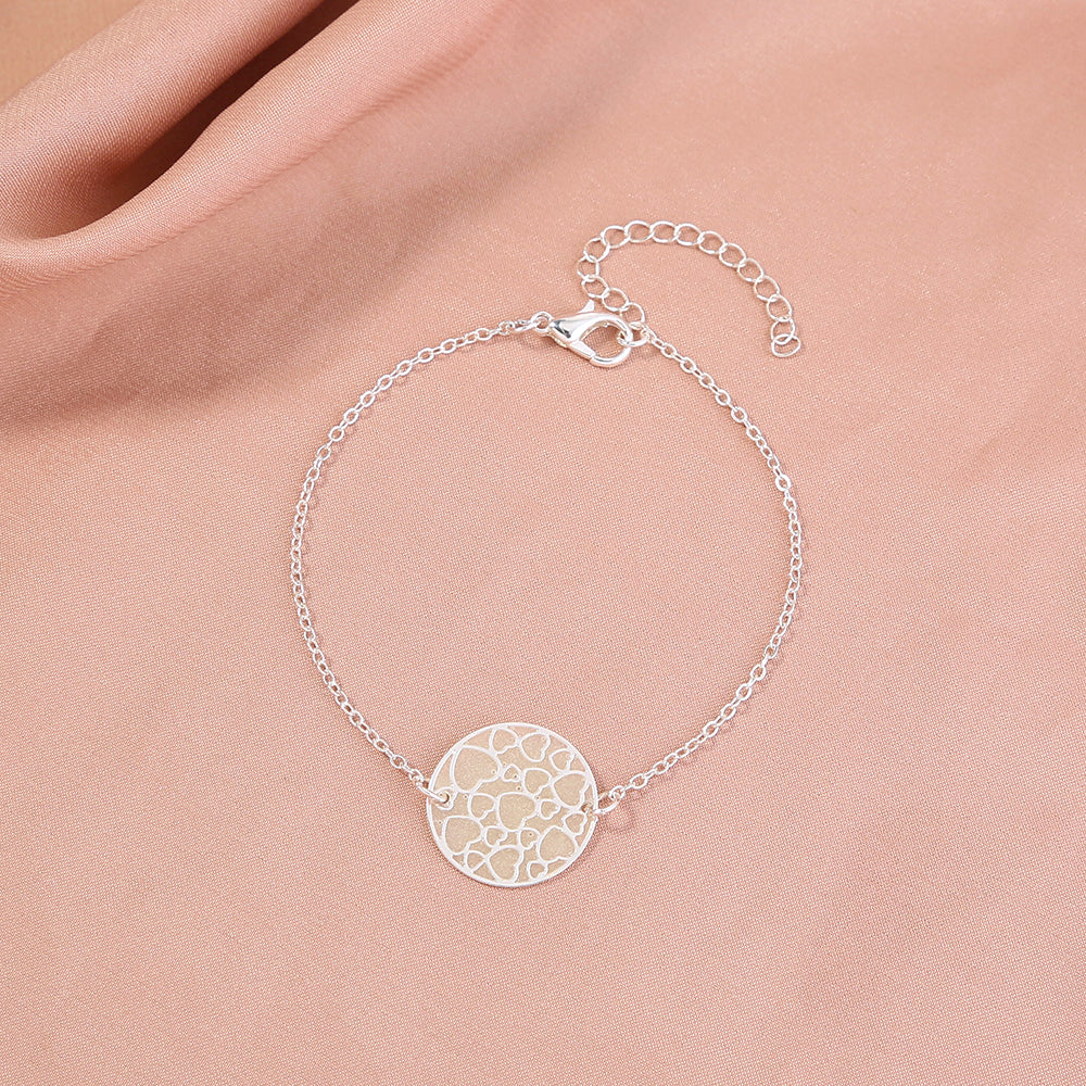 Silver Round Heart Texture glow-in-the-dark bracelet What Else You Got?