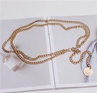 Ladies Dresses Decorated With Thin Belts And Chains