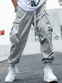 Versatile Multi-Pocket Cargo Pants for Men - Comfortable Streetwear with Drawstring Waist