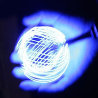 Heavenly Glow LED Light Spiral Toy - Mesmerizing Rotating Luminous Pill Generator for Kids & Adults