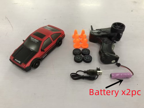 2.4GHz 1:24 4WD RC Drift Car with LED Lights – High-Speed Remote Control Racing Car for Kids (Rechargeable, Cones Included) What Else You Got?
