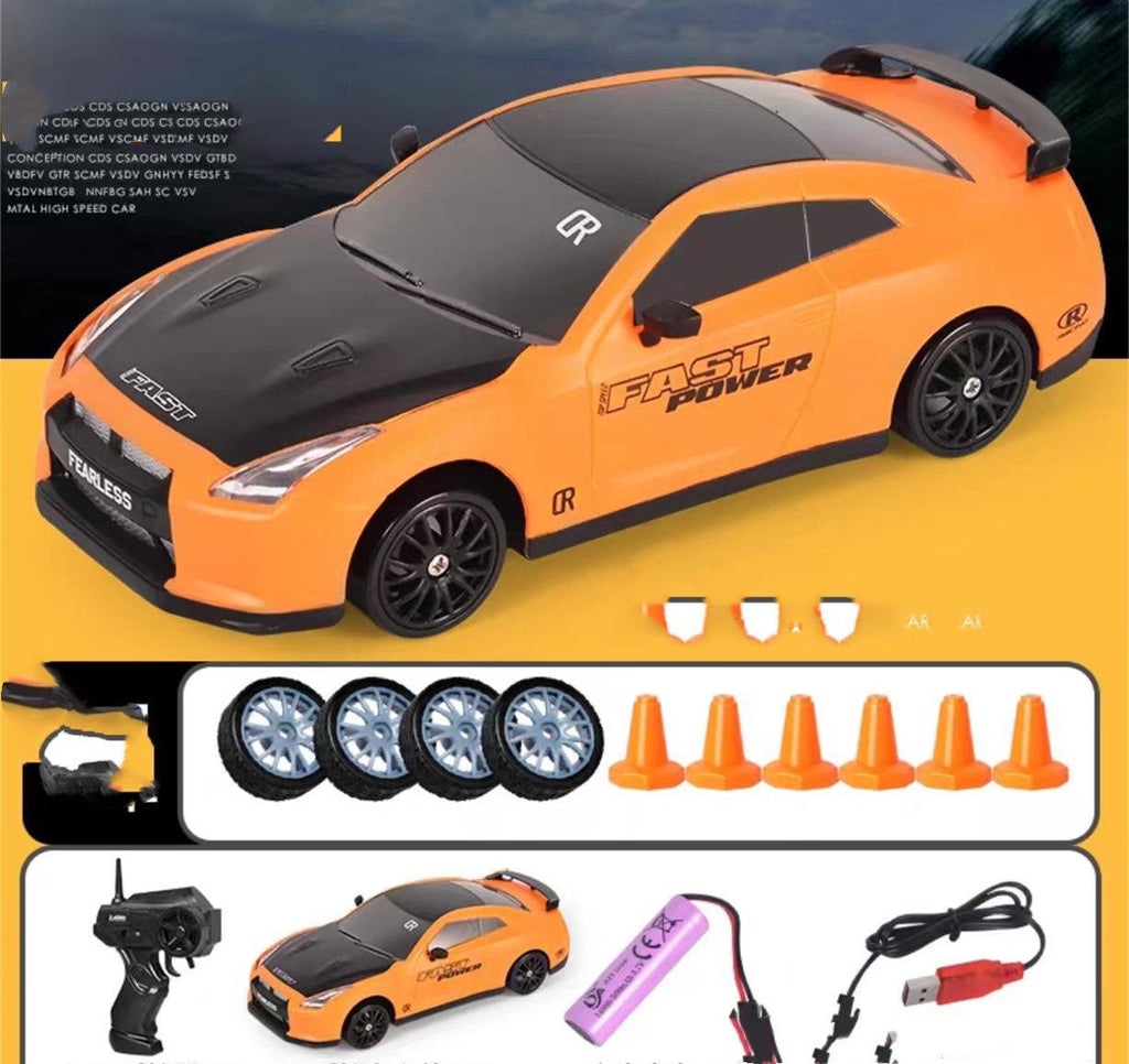 2.4GHz 1:24 4WD RC Drift Car with LED Lights – High-Speed Remote Control Racing Car for Kids (Rechargeable, Cones Included) What Else You Got?