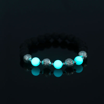 Glowing Faith Bracelet – Black Volcanic Stone with Luminous Beads & Metal Accents (Unisex)