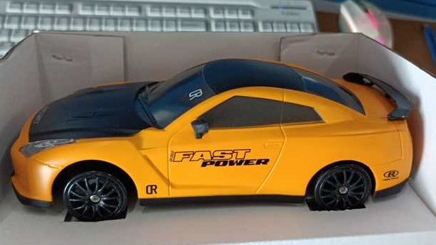 2.4GHz 1:24 4WD RC Drift Car with LED Lights – High-Speed Remote Control Racing Car for Kids (Rechargeable, Cones Included) What Else You Got?