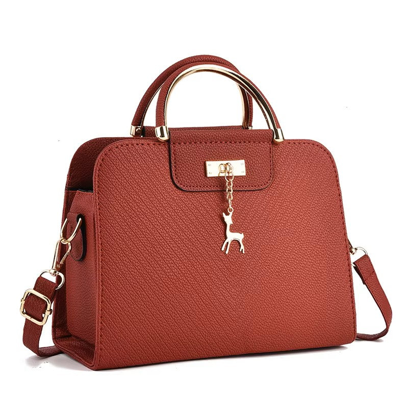 Elegant Hollow‑Out PU Leather Shoulder Bag – Chic Everyday Tote for Women What Else You Got?
