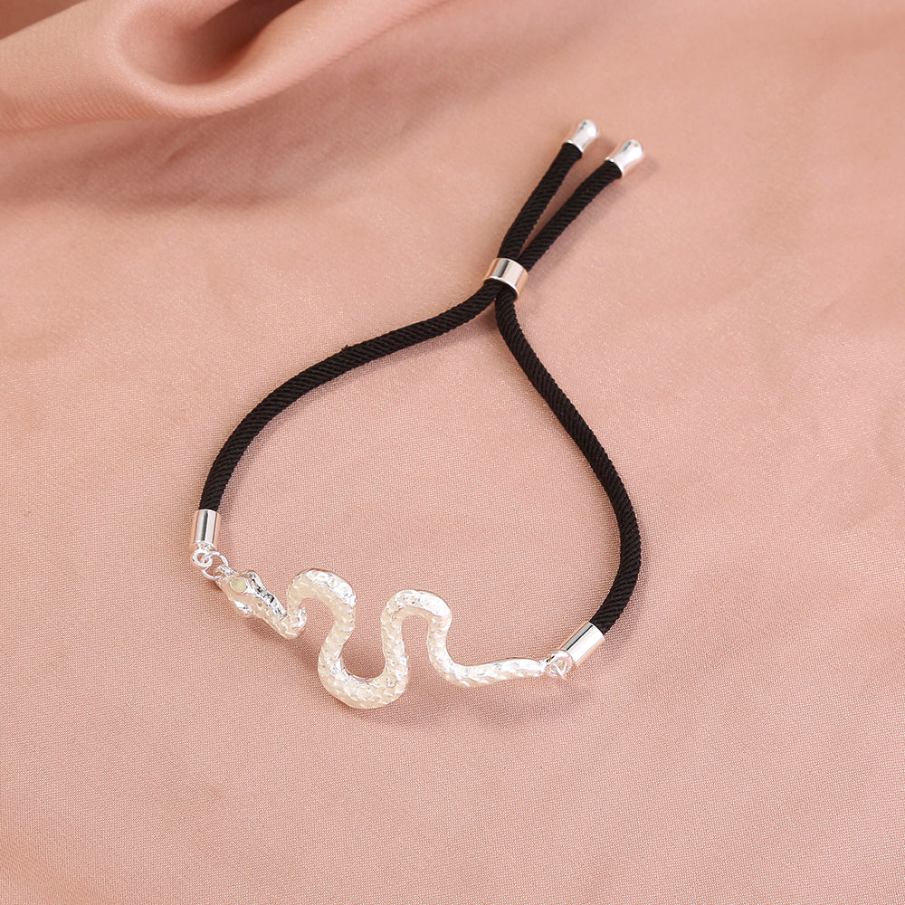 Silver Snake, glow-in-the-dark oil necklace What Else You Got?
