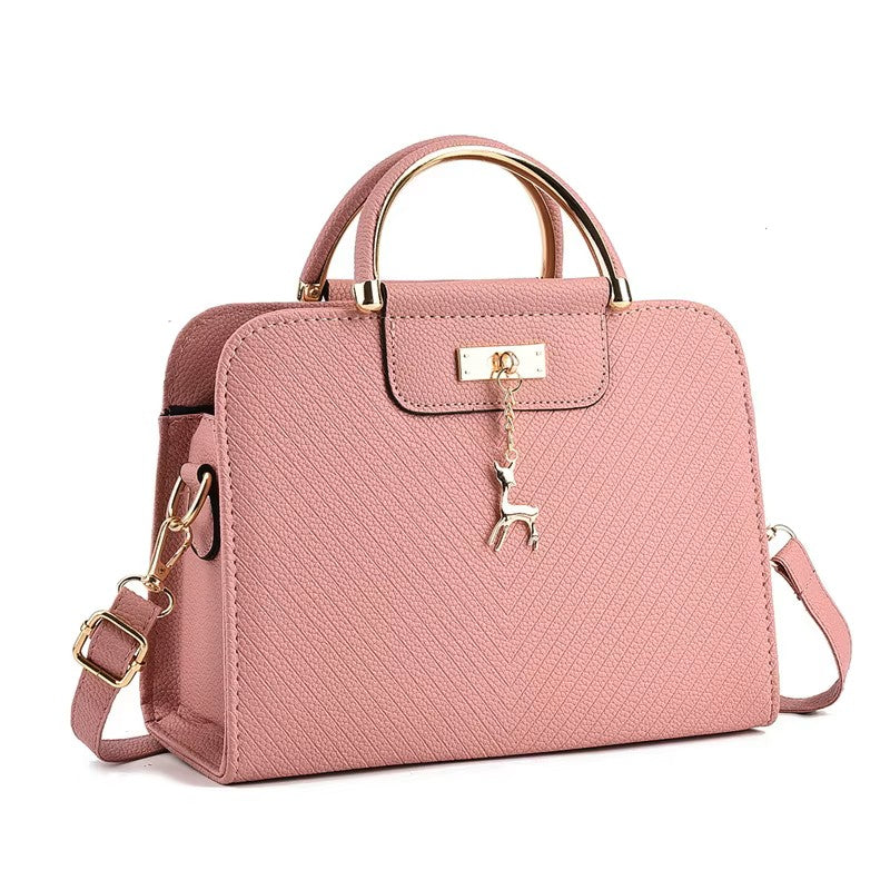 Elegant Hollow‑Out PU Leather Shoulder Bag – Chic Everyday Tote for Women What Else You Got?