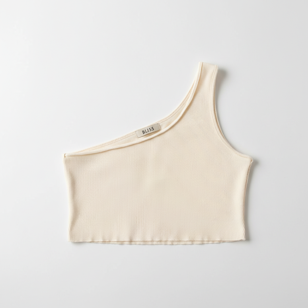 Flat lay of one-shoulder crop top vest showing asymmetric neckline detail