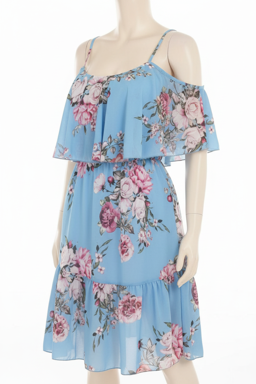 Woman wearing flower print ruffled suspender dress