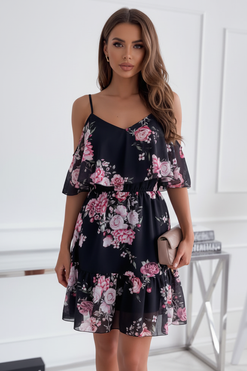 Woman wearing flower print ruffled suspender dress, alternate angle